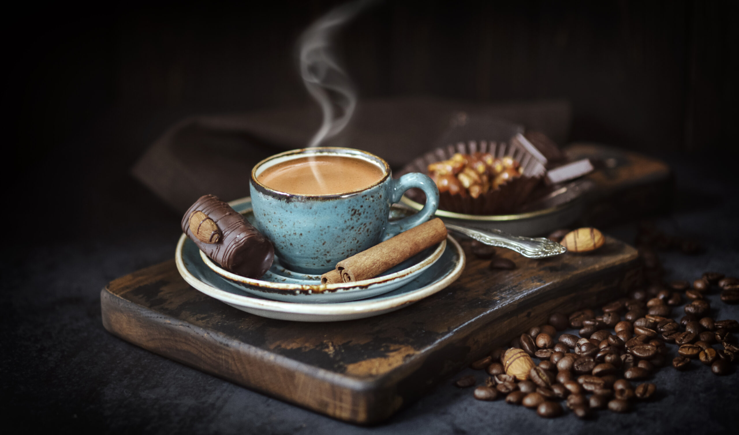 aroma, background, bean ,beans ,drink, black, blue Cup of coffee, and coffee beans, on an old Board,break ,Breakfast, brown ,cafe, caffeine ,chocolate ,chocolate cake, coffee, Cup of coffee, on a rustic background, espresso ,with cinnamon sticks ,mug, dark, drink, espresso ,food ,fresh ,hot, morning, mug, natural, nuts, fried, rustic ,table, taste , wood